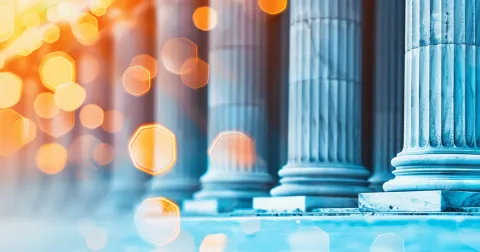 Close up of bank pillars with fintech overlay