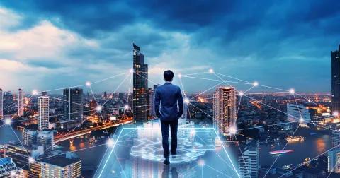 Business man on future network city